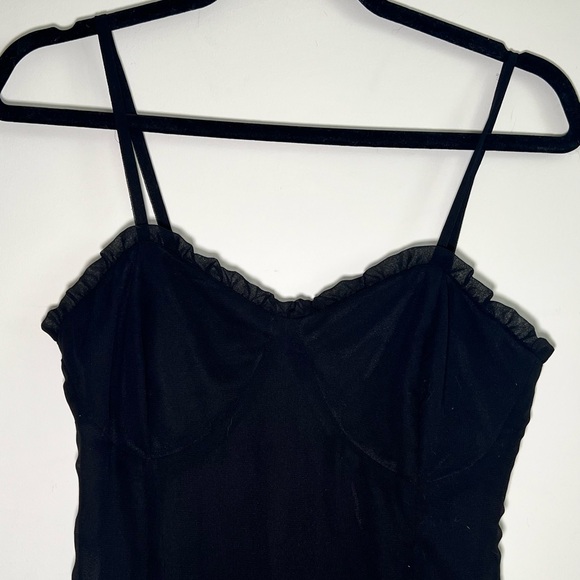 Fitted black spaghetti strap dress and corset and ruffle detail and tiered skirt - Picture 5 of 8